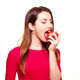 woman eating fruit